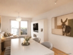 ROOMS4 - top-moderne vier Zimmerwohnung mit Alpenblick - Wohnzimmer mit Blick zum Balkon